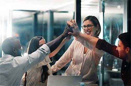 Insight - One global team Team group high five