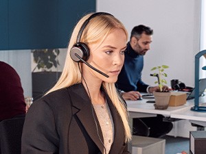 Ensure Reliability and Compatibility Young female worker concentrates during a call